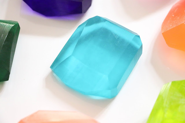 Learn how easy it is to make your own soap using melt and pour soap base and turn it into these colorful faceted jewel soaps.
