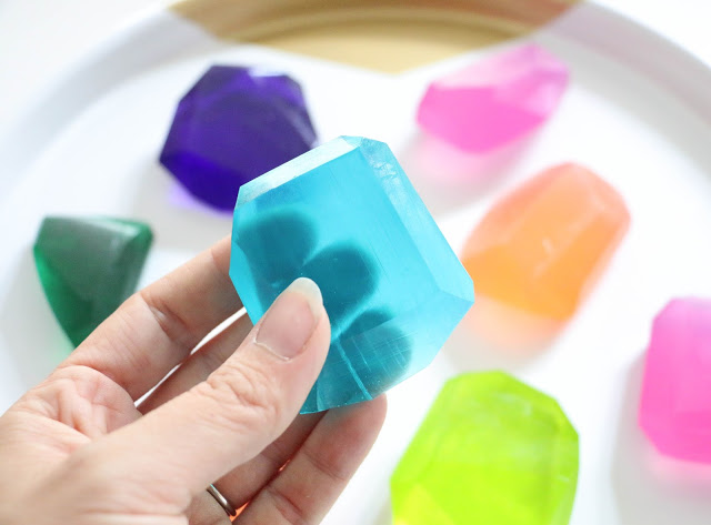 Learn how easy it is to make your own soap using melt and pour soap base and turn it into these colorful faceted jewel soaps