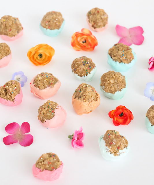 No Bake Sunbutter Granola Balls dipped in colorful chocolate