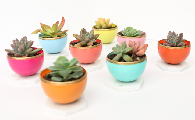  DIY Mini Spring Succulent Planters from Plastic Easter eggs! What a fun craft idea that is perfect for a spring party or bridal shower.