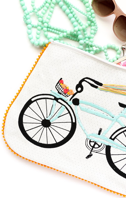 DIY Embroidered Bike Pom Pom Clutch with Tassel Zipper - Learn how to sew a clutch - how to sew and bag - zippered bag tutorial - clutch tutorial - DIY Summer Accessories