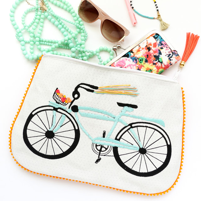 DIY Embroidered Bike Pom Pom Clutch with Tassel Zipper - Learn how to sew a clutch - how to sew and bag - zippered bag tutorial - clutch tutorial - DIY Summer Accessories