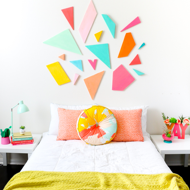 Learn how to DIY your own light weight colorful geometric headboard using craft foam sheets by FloraCraft. Easy triangle and polygon shaped bedroom decor - quick craft - home DIY project