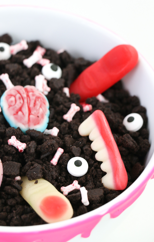 DIY Halloween Dessert - Body Part dirt and worms with a DIY bones trivet and neon pink blood dripped bowl - Halloween party ideas - how to make halloween food - creepy Halloween desserts and crafts - Neon Pink Halloween Decorations