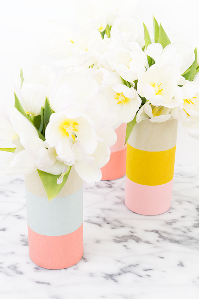 http://sarahhearts.com/2015-02-02/diy-color-blocked-wood-vases/